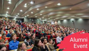full lecture theatre audience